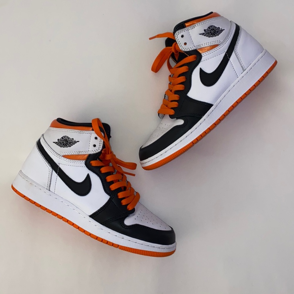 Jordan Women's Sneakers in Black, White, and Orange